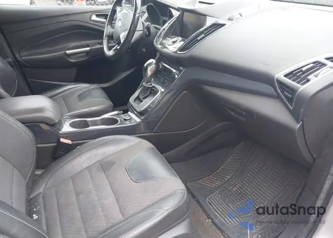 2013 Ford Escape Titanium z USA, uszkodzony, nr VIN 1FMCU9J94DUD63365